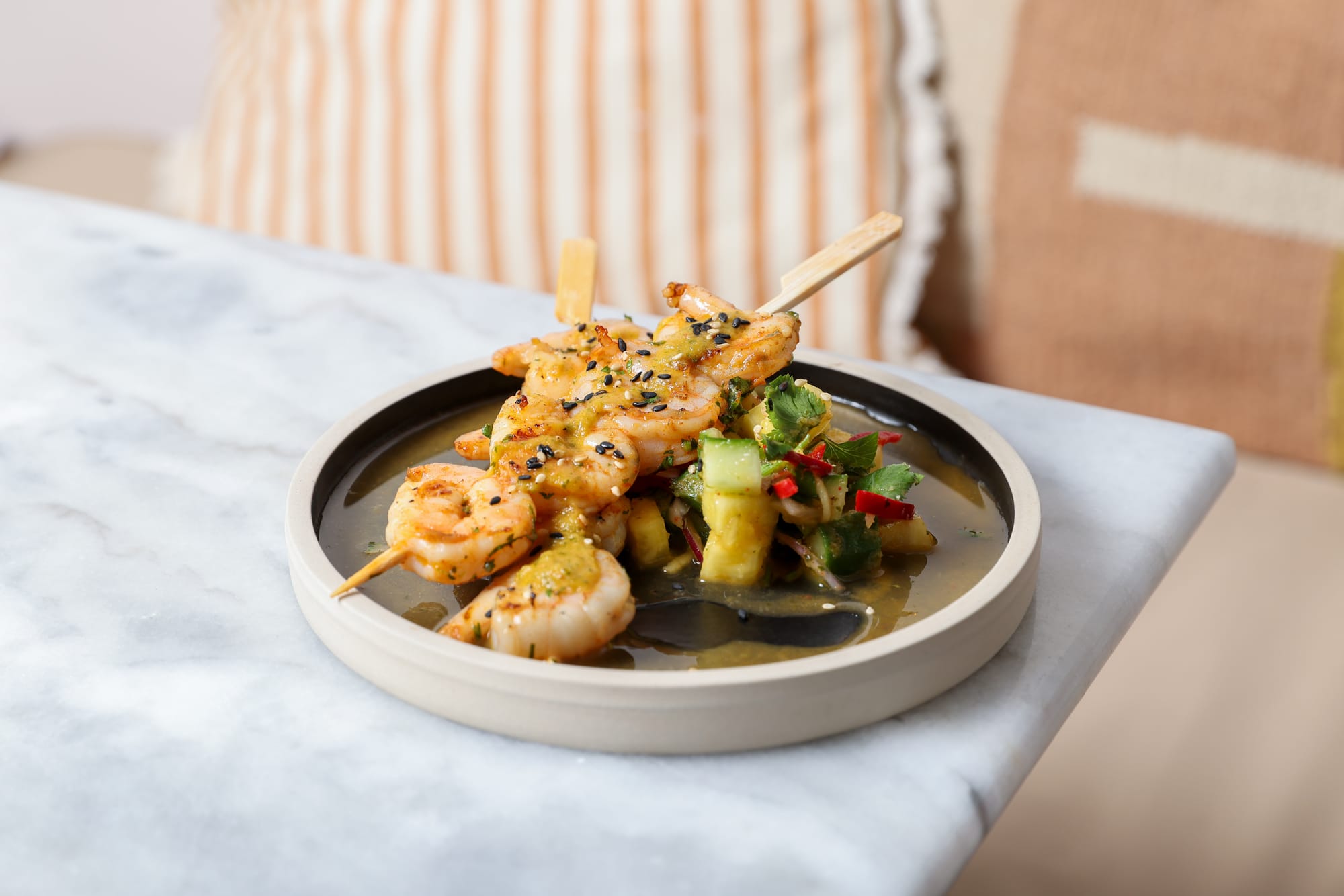 Chili prawn and pineapple skewers with cucumber