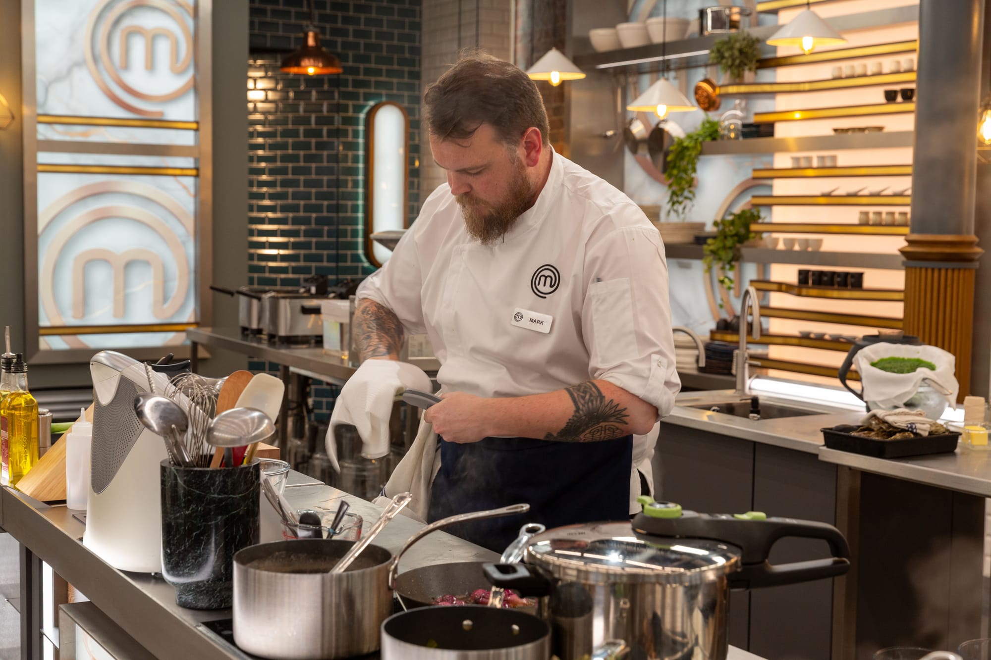 Chef Mark cooking in the MasterChef kitchen