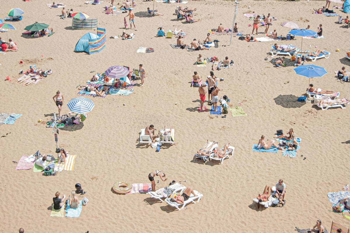 Here's to beach days and sun rays. Photo: Ferran Feixas/unsplash