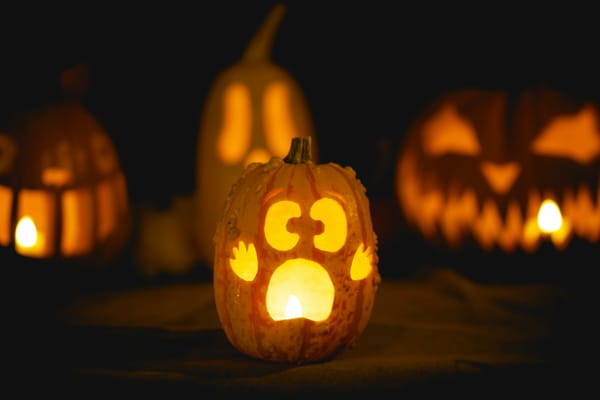 A cute pumpkin with a cartoon scared face